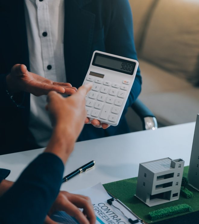 Real estate agent talked about the terms of the home purchase agreement and asked the customer to sign the documents to make the contract legally, Home sales and home insurance concept.